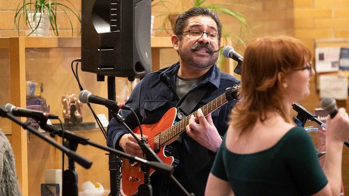 NIC Director of Choirs Max Mendez performs with students on Dec. 1 in the lobby of Boswell Hall on NIC’s Coeur d’Alene campus.