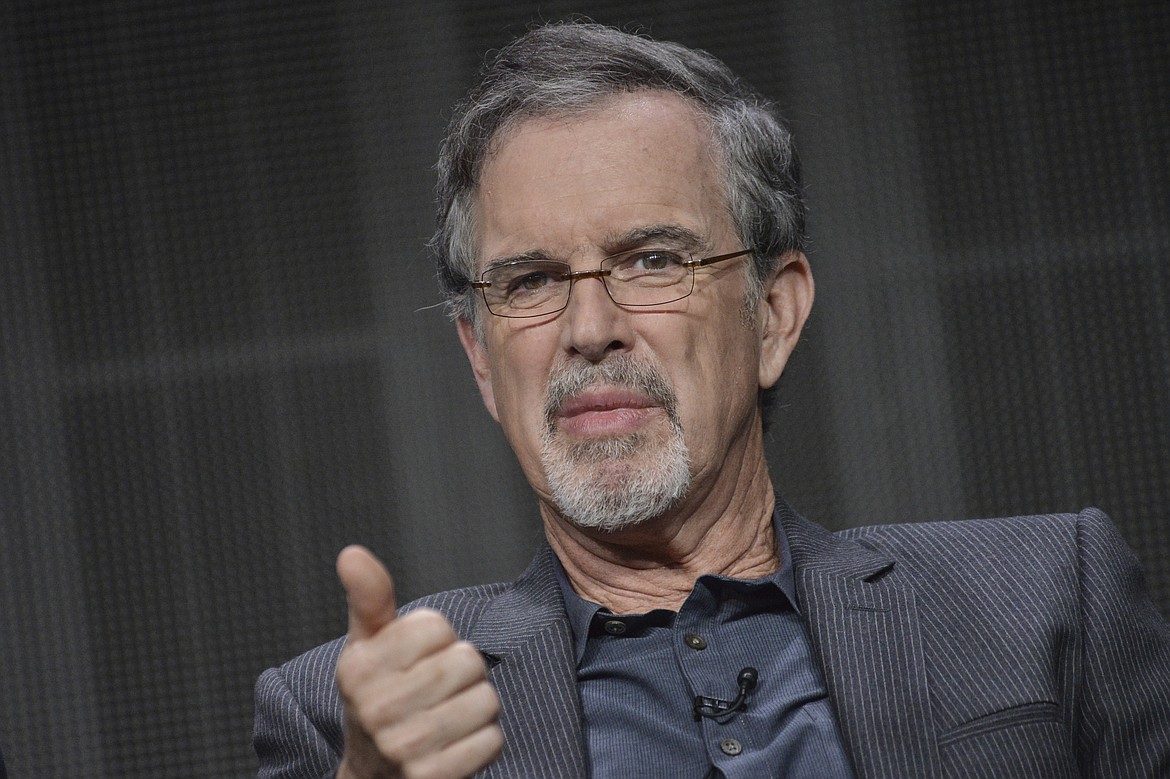 FILE - In this July 12, 2014 file photo, Garry Trudeau speaks onstage during the "Alpha House" panel at the Amazon 2014 Summer TCA, in Beverly Hills, Calif. (Photo by Richard Shotwell/Invision/AP, File)