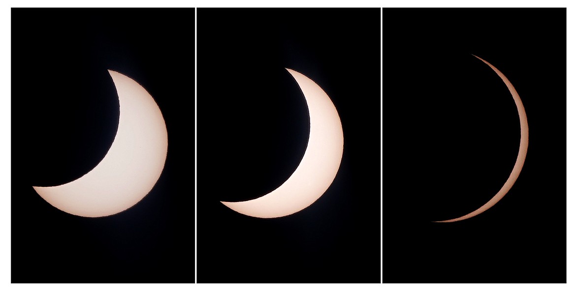 is combination image of photos shows a hybrid solar eclipse seen from Lautem, East Timor, Thursday, April 20, 2023. A rare solar eclipse will cross over remote parts of Australia, Indonesia and East Timor on Thursday. (AP Photo/Lorenio L.Pereira)