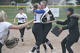 PREP SOFTBALL: Vikings, T-Wolves trade wins