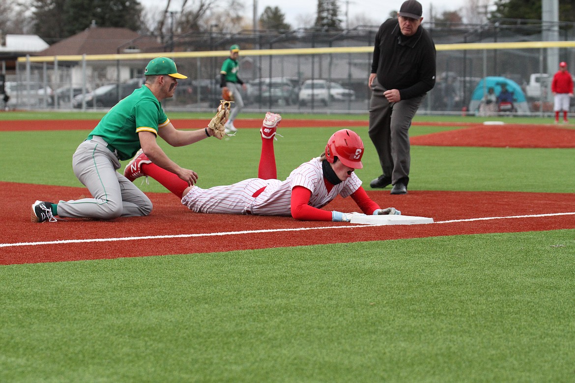 Finn Mellander is thrown out at third base after hitting an RBI double that scored two runs in Game 2.