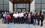 Les Schwab cuts ribbon in Moses
