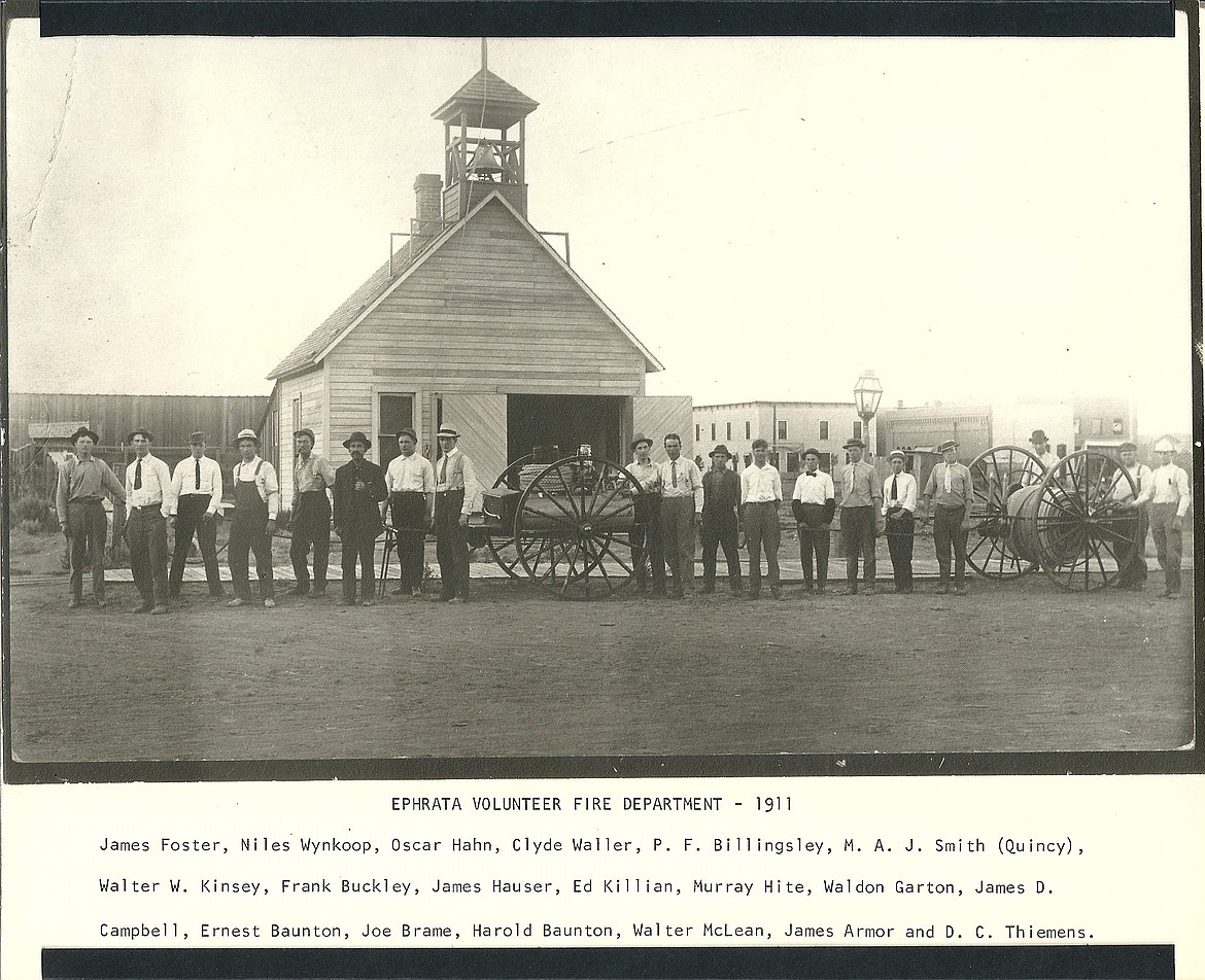 The 1911 Ephrata Volunteer Fire Department shows off its fire equipment.