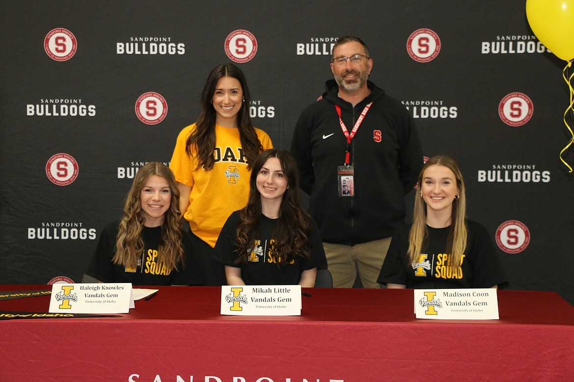 (Left to right): Haleigh Knowles, Mikah Little, and Madison Coon sign with the University of Idaho Vandal Gem Dance Team.