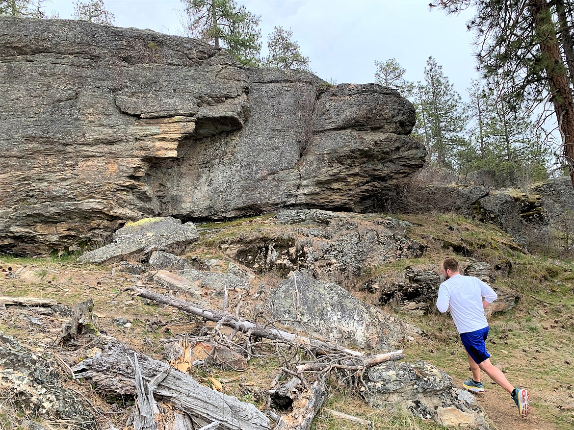 Chris Lakey runs up Tubbs Hill on a recent morning.