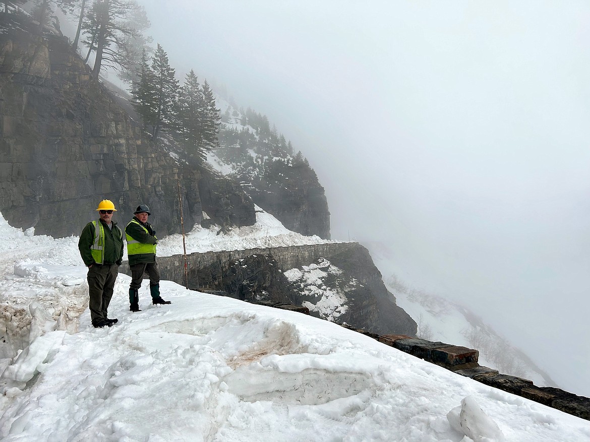 Glacier National Park Engineering Equipment Operator Herb Ferguson and Road Supervisor Brian Paul stand along Going-to-the-Sun Road on Monday, April 24, 2023. (Taylor Inman/Daily Inter Lake)