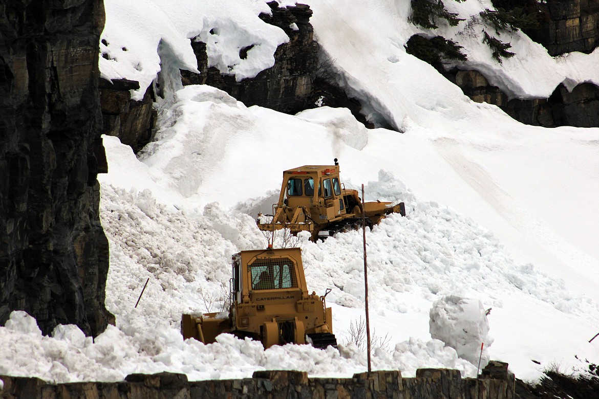 Heavy machinery is used to clear snow from the Haystack Creek areas of Going-to-the-Sun Road in Glacier National Park on Monday, April 24, 2023. (Taylor Inman/Daily Inter Lake)