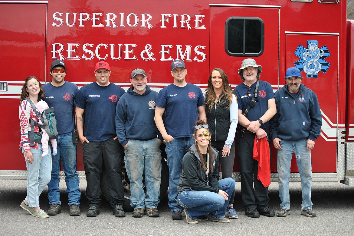 Heather Pecora, Josh Pecora, Cody Goins, Calvin Berry, Scott Dodd, Tifani Amberson, Angela Visintin, Dan Clemts, and Donald Mellen helped serve up burgers and hot dogs, superivse childrens games, gave fire truck tours, and spent time with community members who came out for the BBQ fundraiser over the weekend for local first responders. (Amy Quinlivan/Mineral Independent)