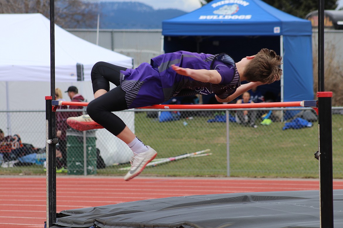 Charlo's Karson Cox clears the bar during Saturday's meet in Missoula. (Michelle Sharbono photo)