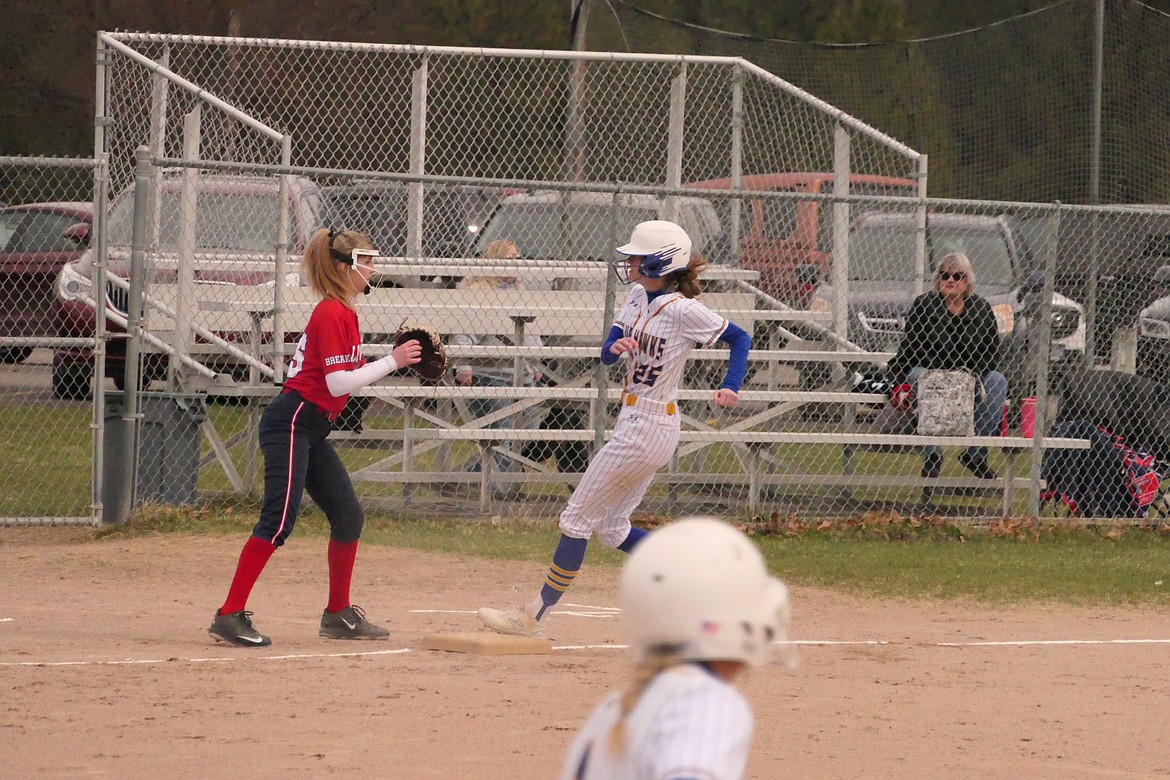 Thompson Falls' Taylor Saner (25) goes into third base standing up during the Lady Hawks 19-1 rout of Loyola last Monday at Pirk's Place in Thompson Falls. (Chuck Bandel/VP-MI)