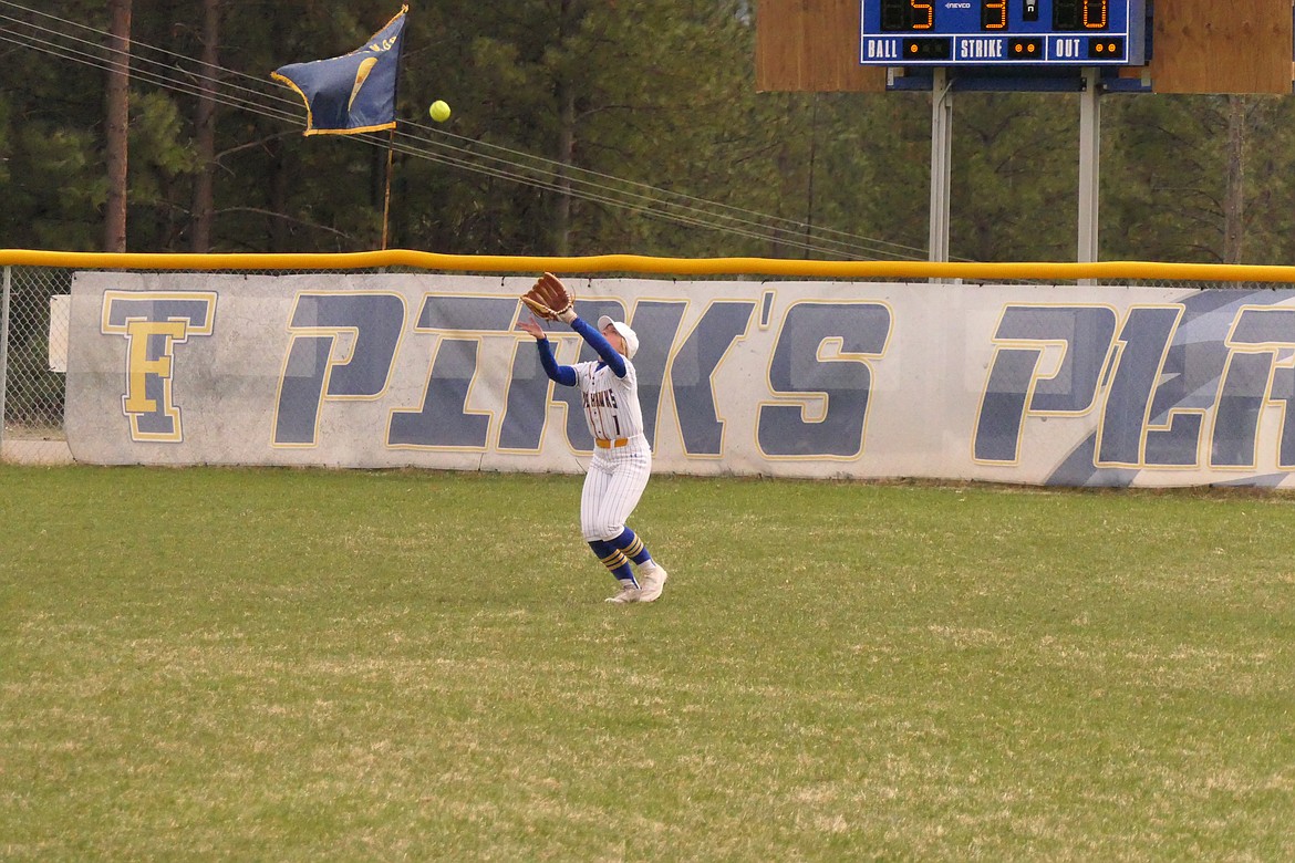 Lady Hawks center fielder Liv McCormick waits to snag a fly ball during T Falls' 19-1 win over Loyola Sacred Heart last Monday in Thompson Falls. (Chuck Bandel/VP-MI)