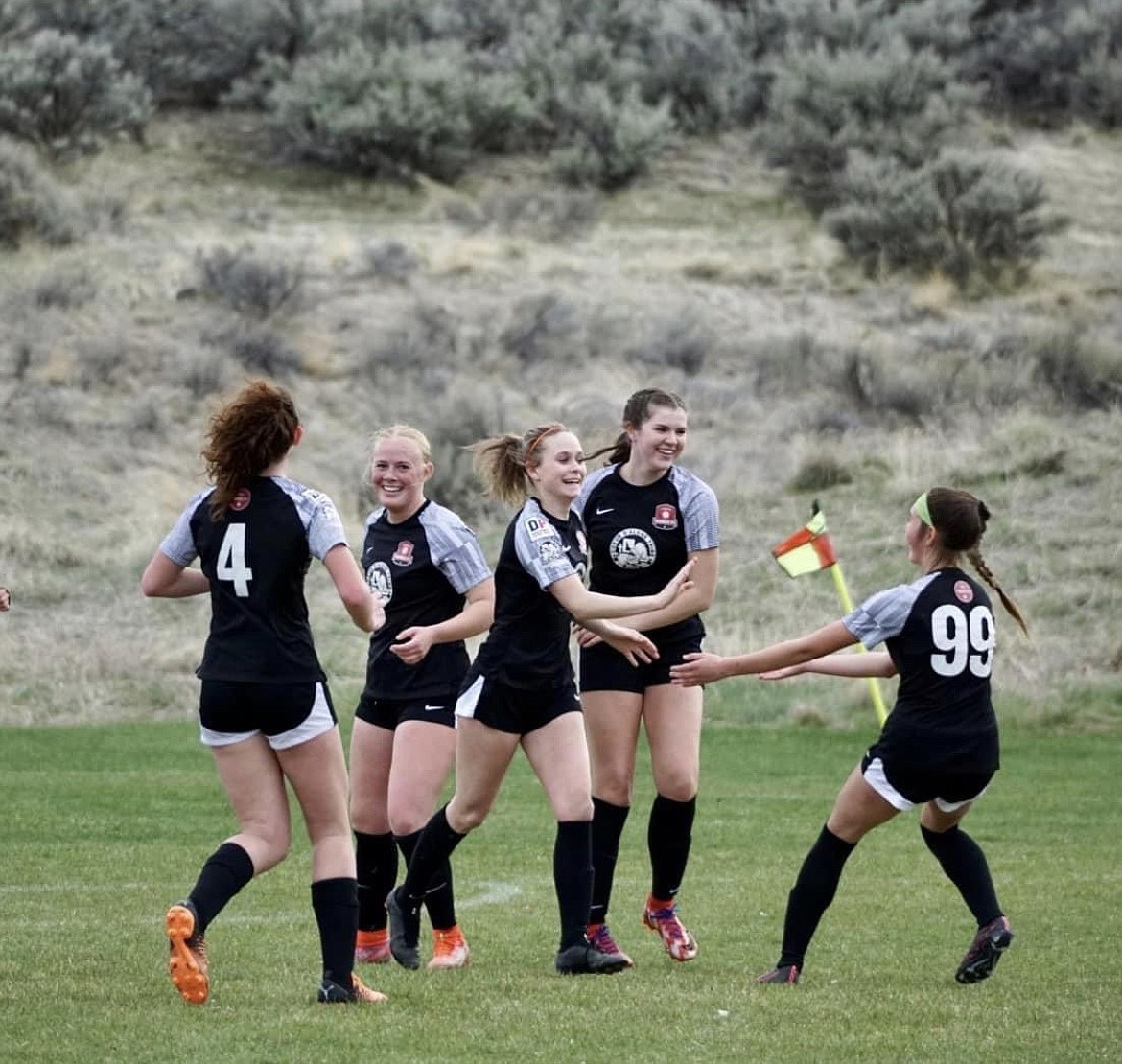Photo by MICHAELA OBERGH
Evelyn Bowie (4), Kennedy Hartzell, Marlee McCrum, Libby Morrisroe and Ava Glahe (99) of the Thorns North FC 07 girls Academy soccer team celebrate a goal vs. BTT 07G ECNL team during state league play. The Thorns ended the weekend with a 1-1 tie vs BTT 07G ECNL, 1-0 loss vs Idaho Rush 07 Elite and a 6-0 win vs BTT 07G Thorns.