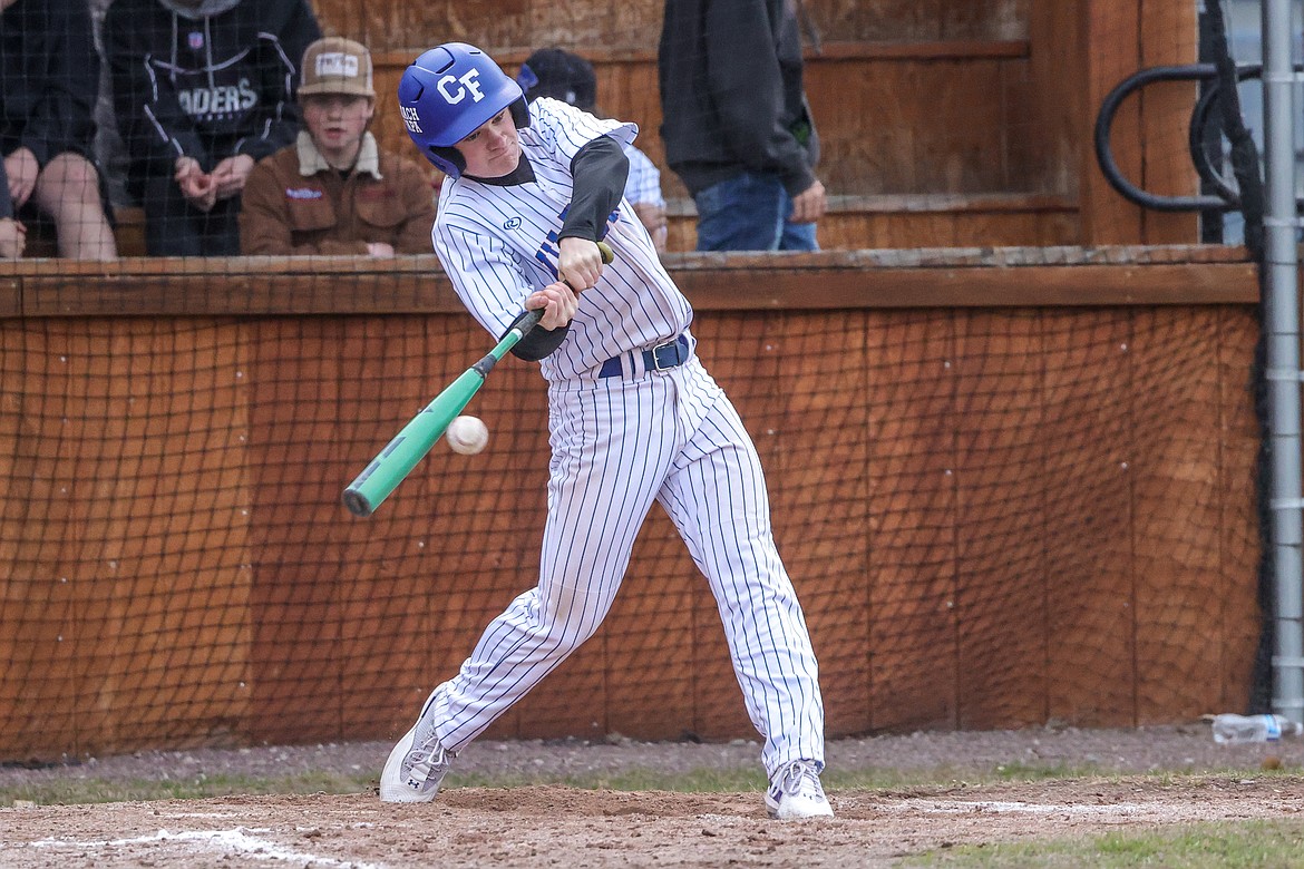 Junior Mark Robison gets a hit at home against Browning. (JP Edge photo)