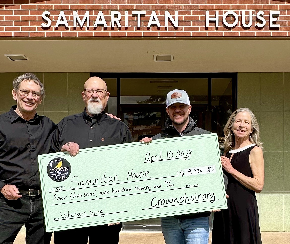 The Crown of the Continent Choir presents a donation to the Samaritan House a few weeks after their benefit concert earlier this year. (Provided photo)