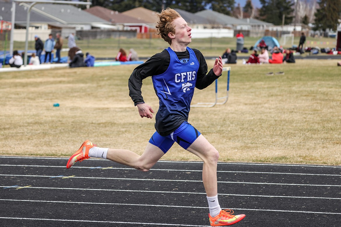 Jack Phelps competes in the 400m dash at home in the Iceberg Invite on Saturday. (JP Edge photo)