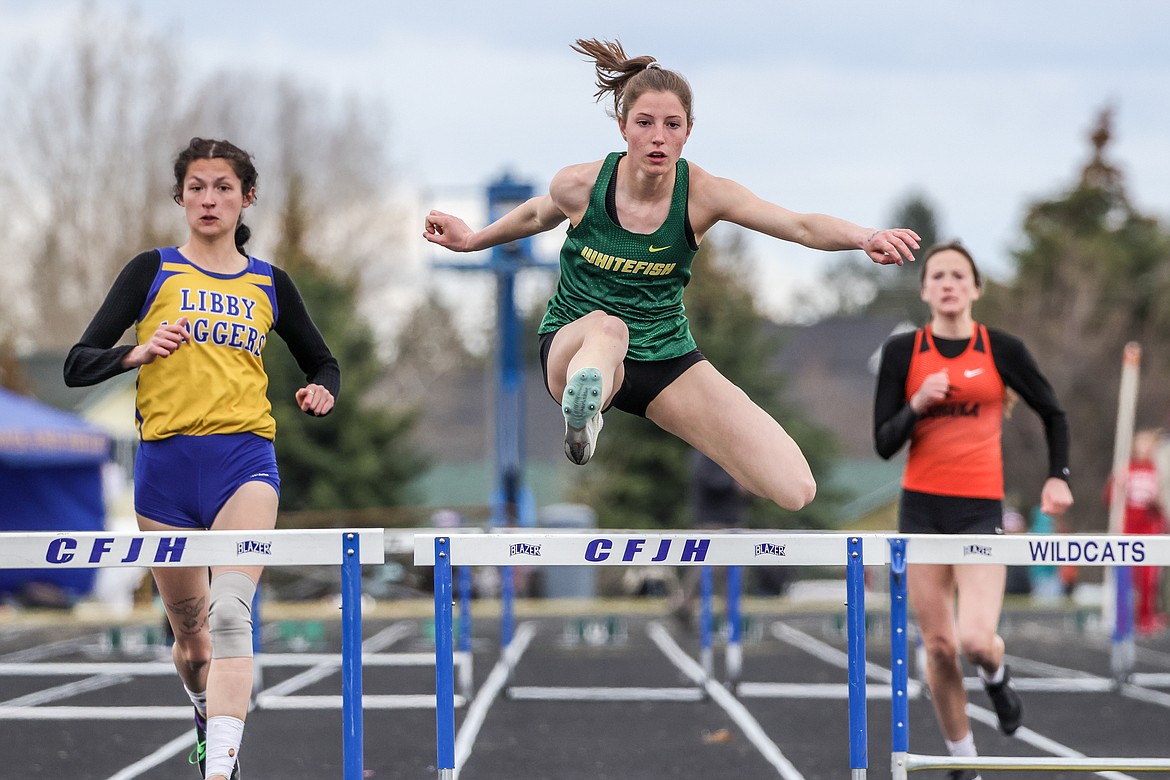 Junior Hailey Ells competes in the girls 300m hurdles at the Iceberg Invite in Columbia Falls on Saturday. (JP Edge photo)