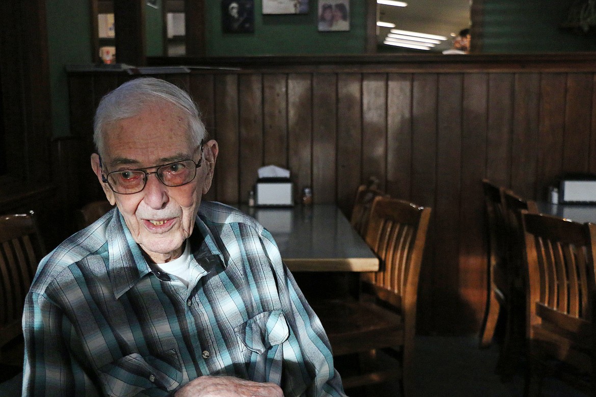 Darrell Ewing listens to a story at his birthday celebration on Tuesday.