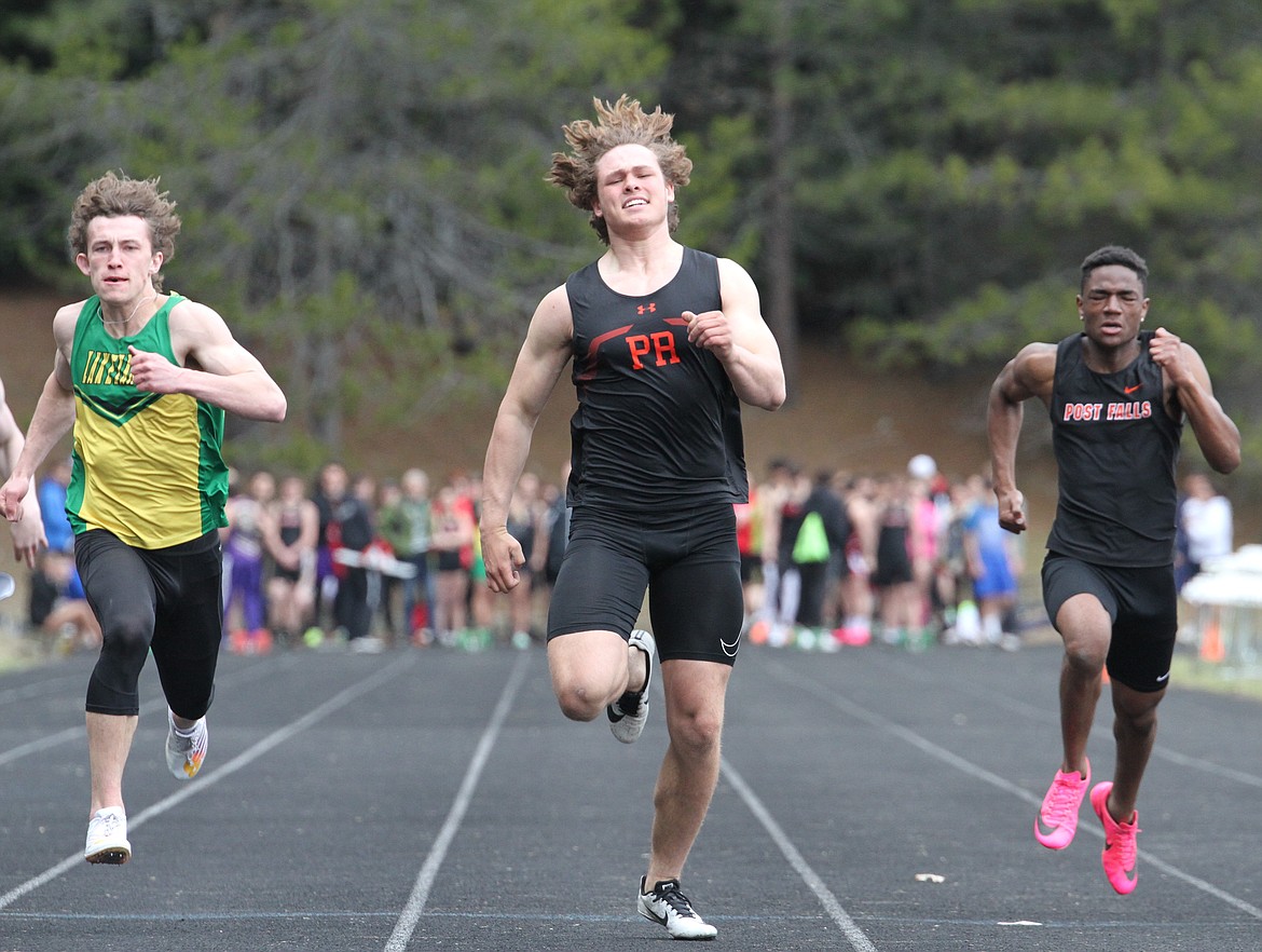 Matyus McLain finishes the 100-meter dash on Saturday at the Priest River Invitational. McLain won the event with a time of 11.69 seconds. McLain also won the shot put and discus with throws of 51-6 and 147-7, respectively.