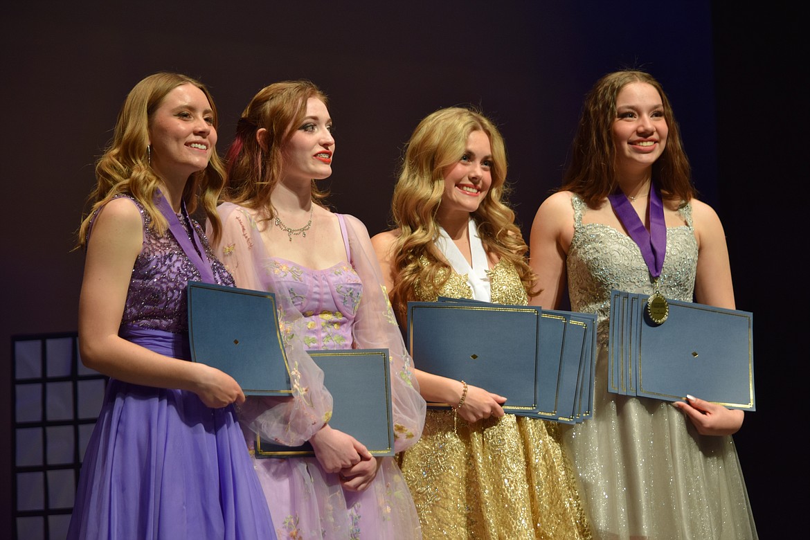 The four finalists for the Distinguished Young Woman of Moses Lake at the end of the competition on Saturday: Second Runner Up Tori Moser, Madison Kultgen, Distinguished Young Woman Addy Carlile and First Runner Up Sydney Garza.