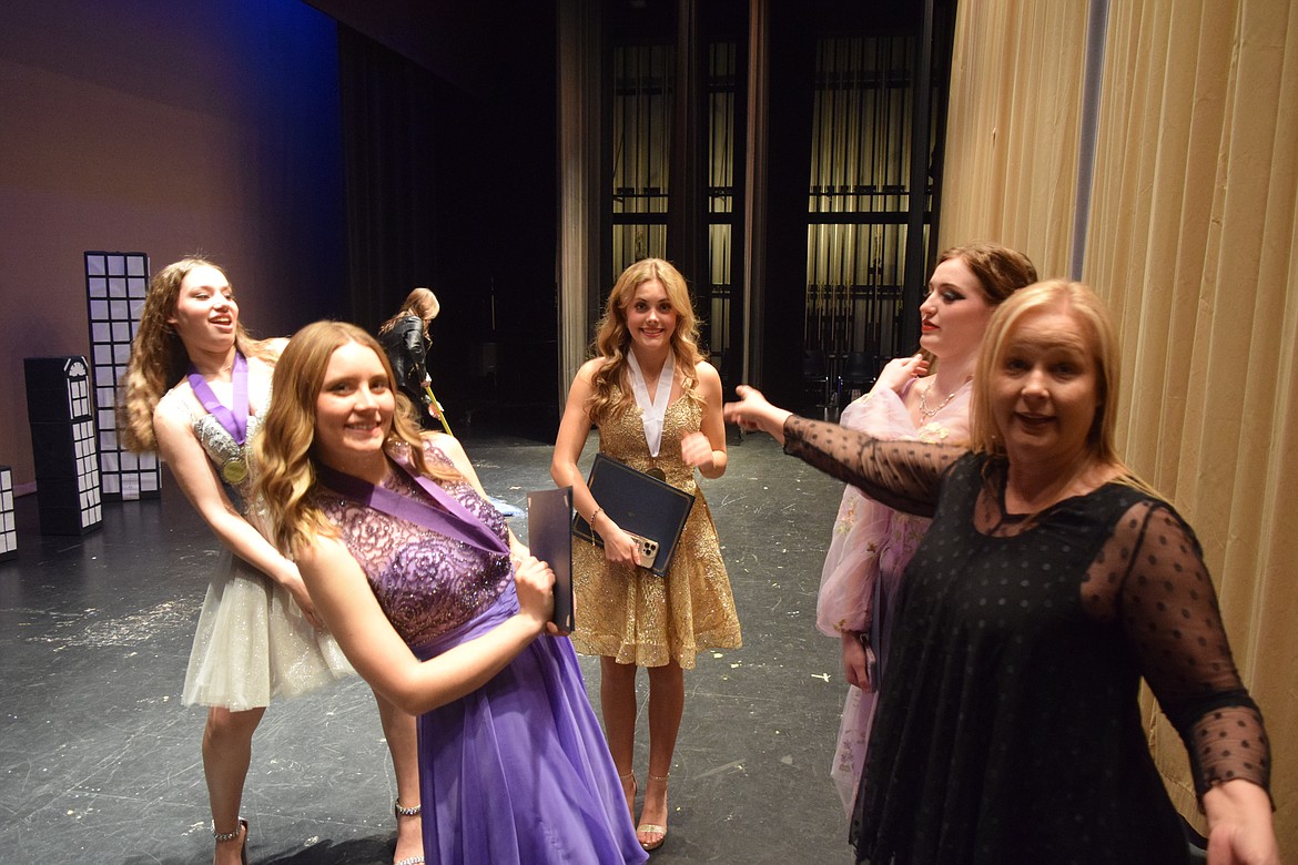 Backstage in the auditorium of Moses Lake High School with the finalists in this year’s Distinguished Young Women competition (left to right): First Runner Up Sydney Garza, Second Runner Up Tori Moser, Distinguished Young Woman Addy Carlile, Madison Kultgen, and Jennifer Gaddis, who sits on the Distinguished Young Women of Moses Lake board and won the competition in 1985. “I want to give back to the program,” Gaddis said. “The program gave me a lot, and it’s time I give the program back some of what it gave me.”