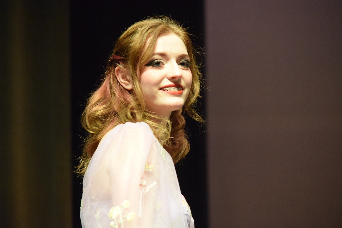 Madison Kultgen walks the stage during the Distinguished Young Women competition at the Moses Lake High School auditorium on Saturday.