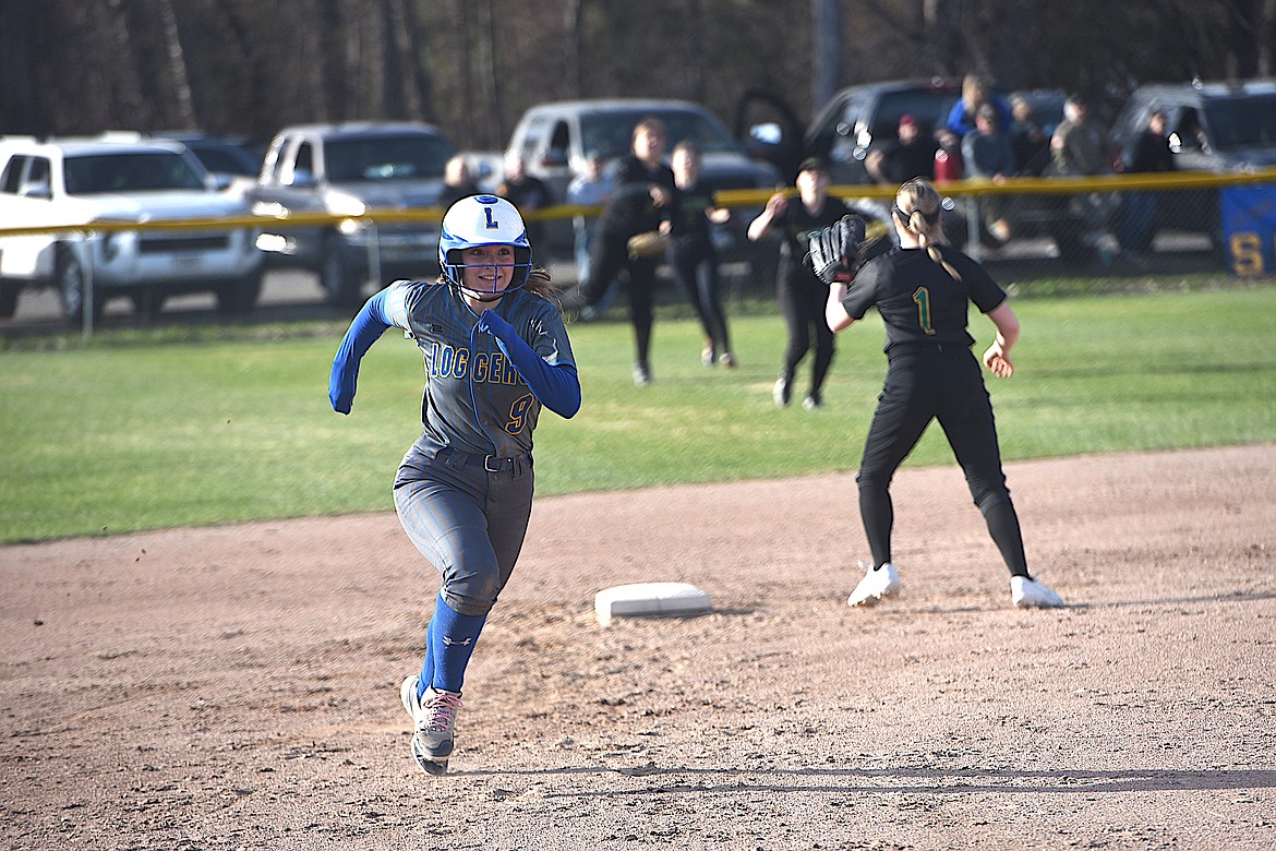 Libby Destinee Crawford heads to third base against Whitefish in Tuesday's game. (Scott Shindledecker/The Western News)