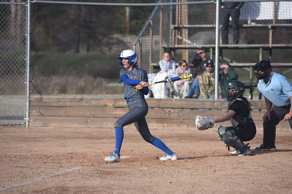 Libby's Lyndee McElmurry doubles against Whitefish in Tuesday's game. The double scored three runs in a 16-1 win. (Scott Shindledecker/The Western News)