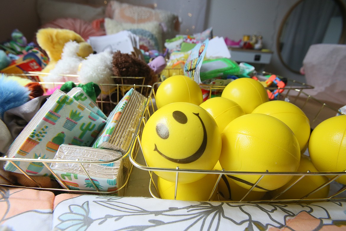 The signature yellow smiley squishy ball makes it into every Kindness Crate sent by Kindness Crates founder Adrienne Roads.