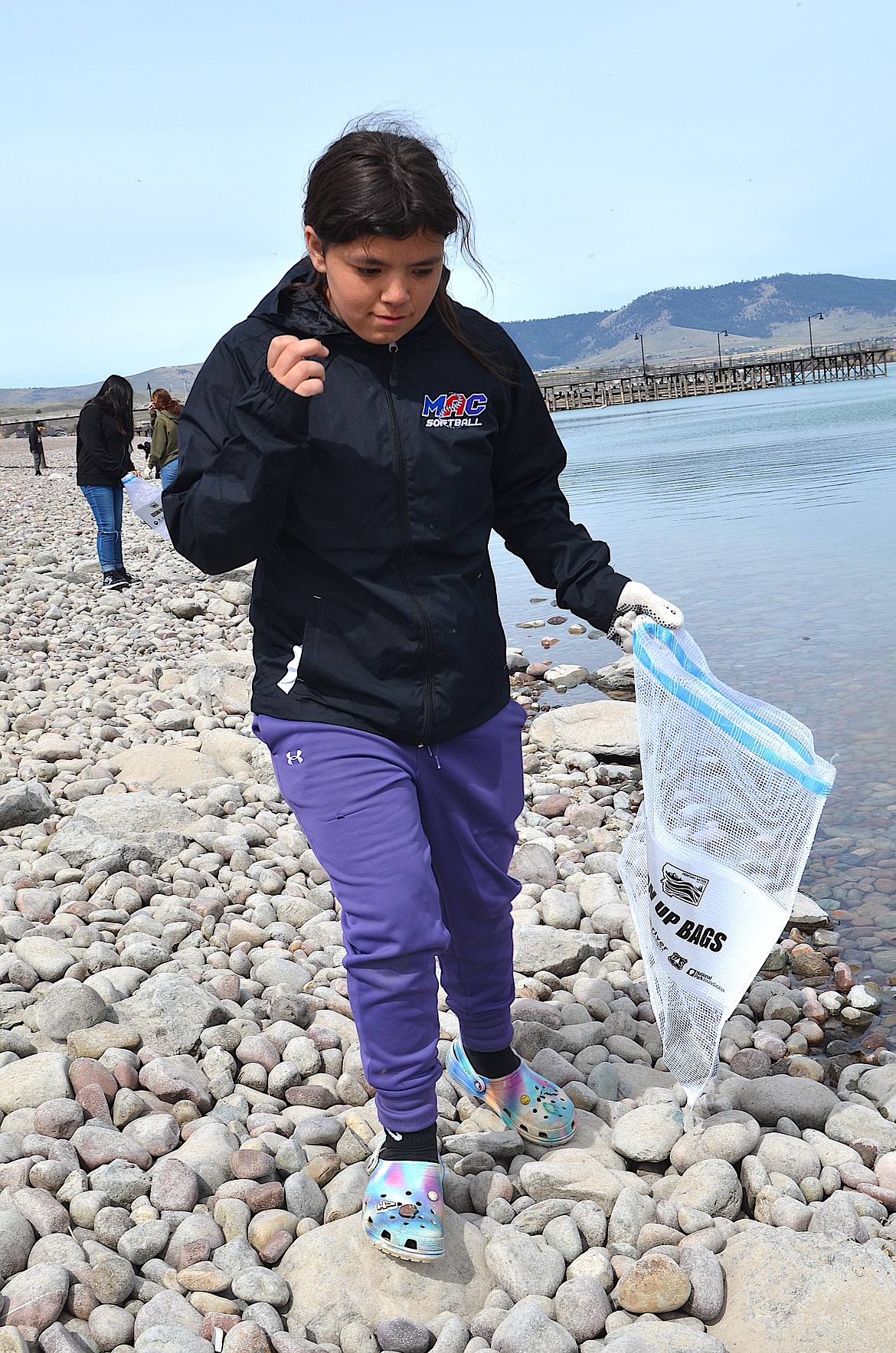 Students from Two Eagle River and St. Ignatius High combed the shoreline along Salish Point, collecting trash and looking for objects with fake mussel-infestations. (Kristi Niemeyer/Leader)