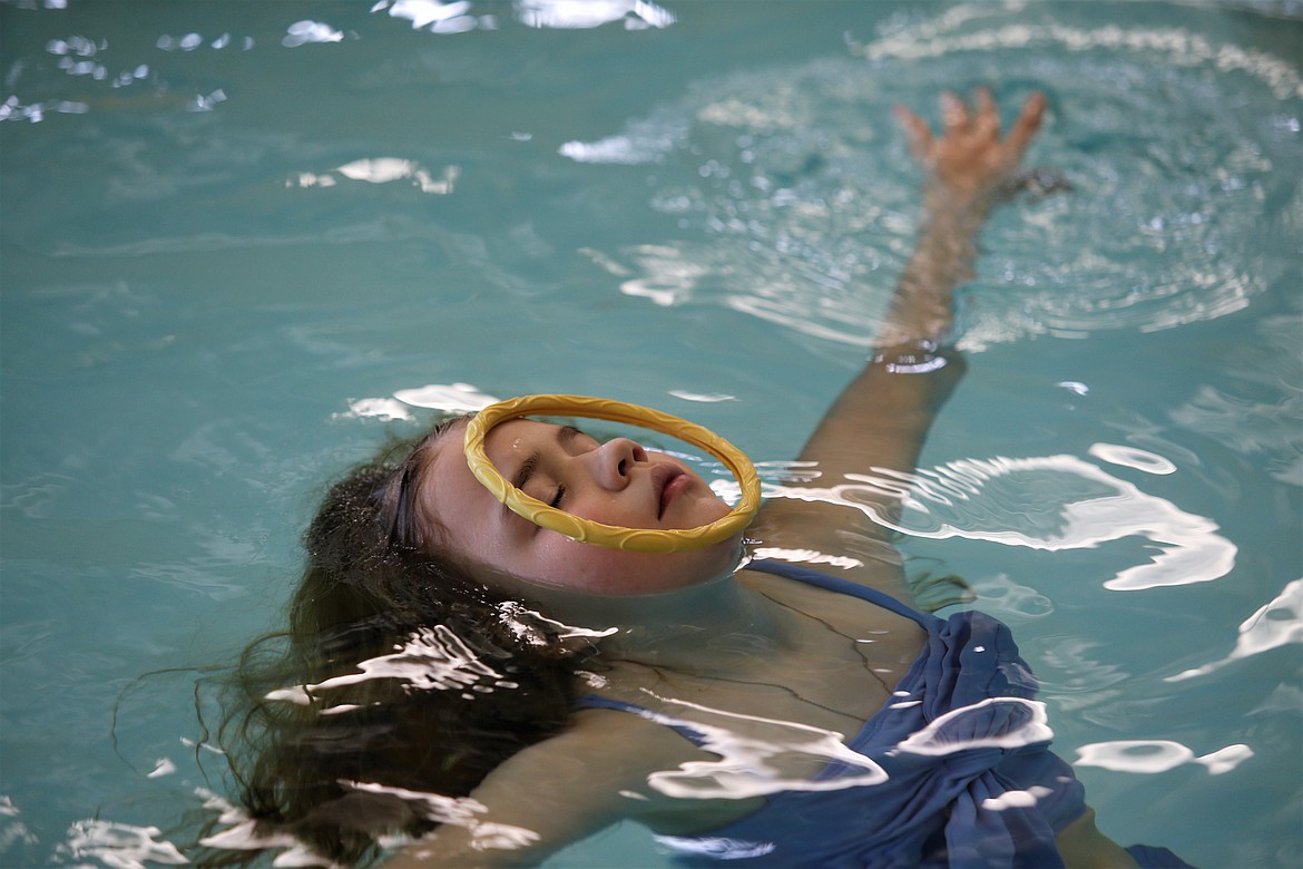 Jacquelyn Merkley participates in a swimming lesson at the Kroc Center on Wednesday.