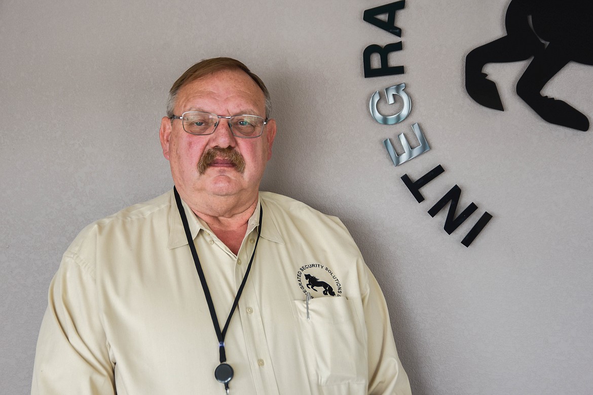 Marquis Laude, the president of Integrated Security Solutions, Inc. stands for a portrait at the company building in Evergreen on April 25, 2023. (Kate Heston/Daily Inter Lake)