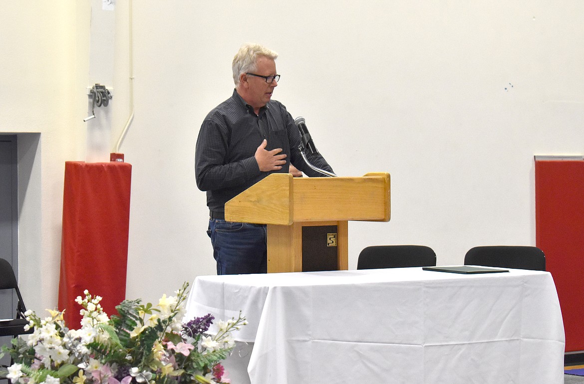 Guest speaker Jim McKiernan addresses the audience at the Columbia Basin Job Corps Center graduation Thursday. McKiernan emphasized the importance of doing things, rather than merely talking about them.