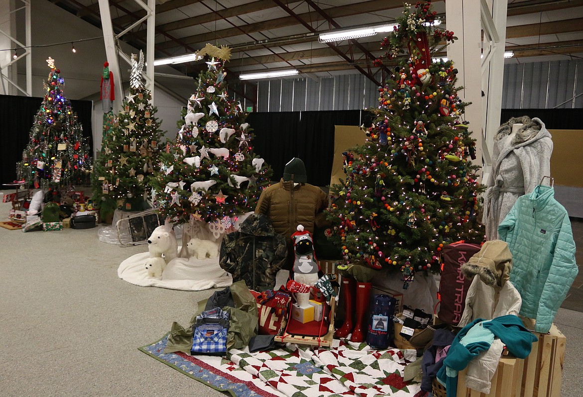 Beautifully decorated trees are seen at a past Festival of Trees event. The Kinderhaven Foundation announced Thursday that it was passing the torch for the event to the Community Resource EnVision Center.