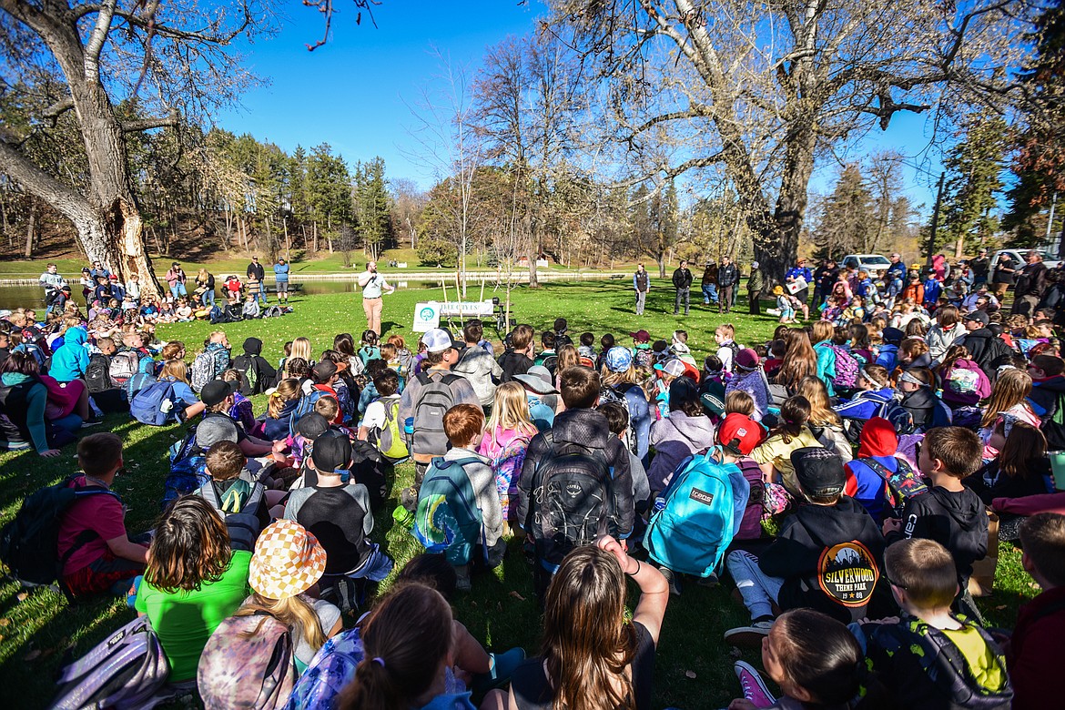 Third-graders from School District 5 gather for a ceremony before breaking off into classroom groups for activities at the Arbor Day celebration at Woodland Park on Friday, April 28. (Casey Kreider/Daily Inter Lake)