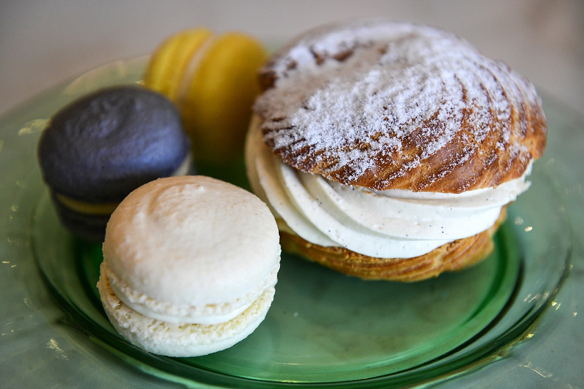 A Paris-Brest with French macarons at Bonjour Bakery & Bistro in Kalispell on Thursday, April 27. (Casey Kreider/Daily Inter Lake)