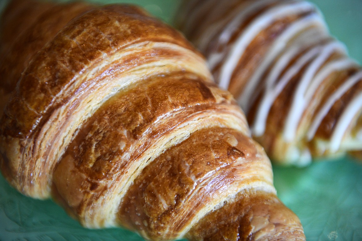 A plain croissant and a raspberry cream cheese croissant and at Bonjour Bakery & Bistro in Kalispell on Thursday, April 27. (Casey Kreider/Daily Inter Lake)