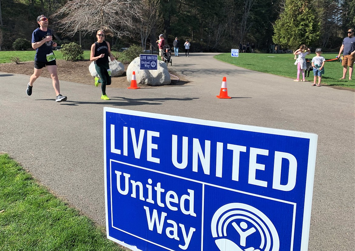 Runners finish the Spring Dash on Saturday at McEuen Park.