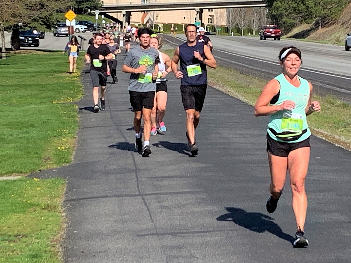 Spring Dash runners head toward the turnaround point on the North Idaho Centennial Trail on Saturday.