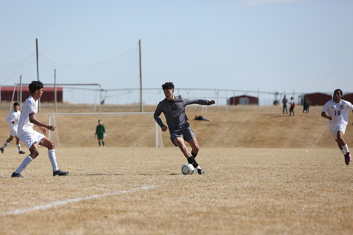 Wahluke sophomore Alex Acevedo pushes the ball upfield against Wapato earlier this season.