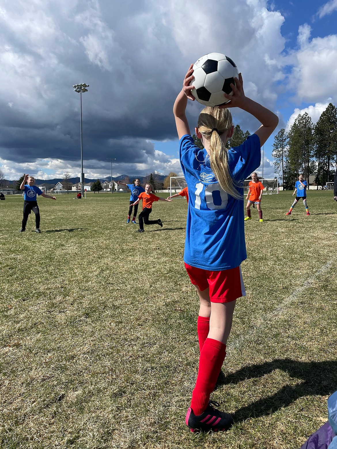 Photo by KRISTEN DVORACEK
Ellie Shupe (10) of CDA Peds throws it in against Idaho Forest in a 3-2 loss in a Coeur d'Alene Recreation Department soccer game on April 22.