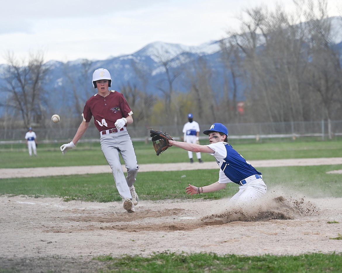 Bulldog Caleb Dunevin reaches for the out during last week's game against Florence-Carleton. (Christa Umphrey photo)