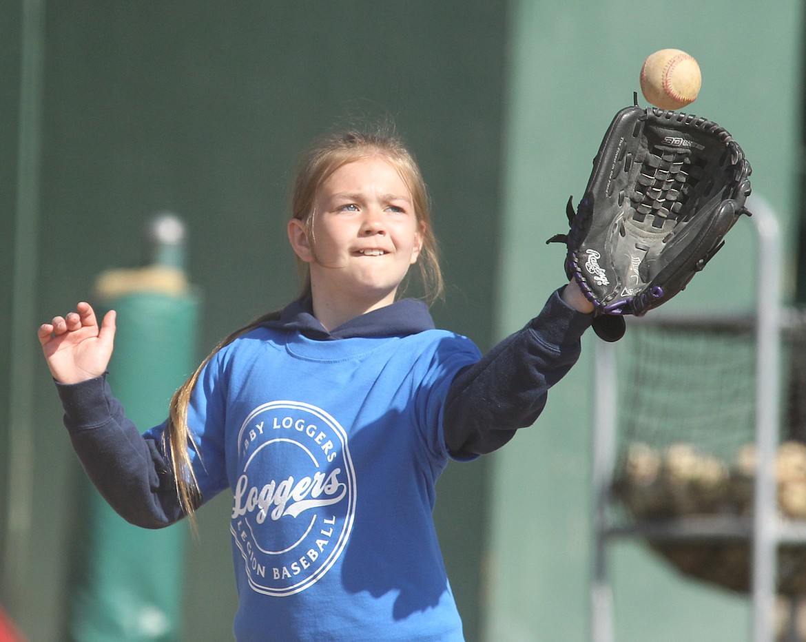 Finley Hannah, 10, catches a fly ball during Libby Loggers Baseball Camp 2023 on Saturday, April 29 at Lee Gehring Field. (Paul Sievers/The Western News)