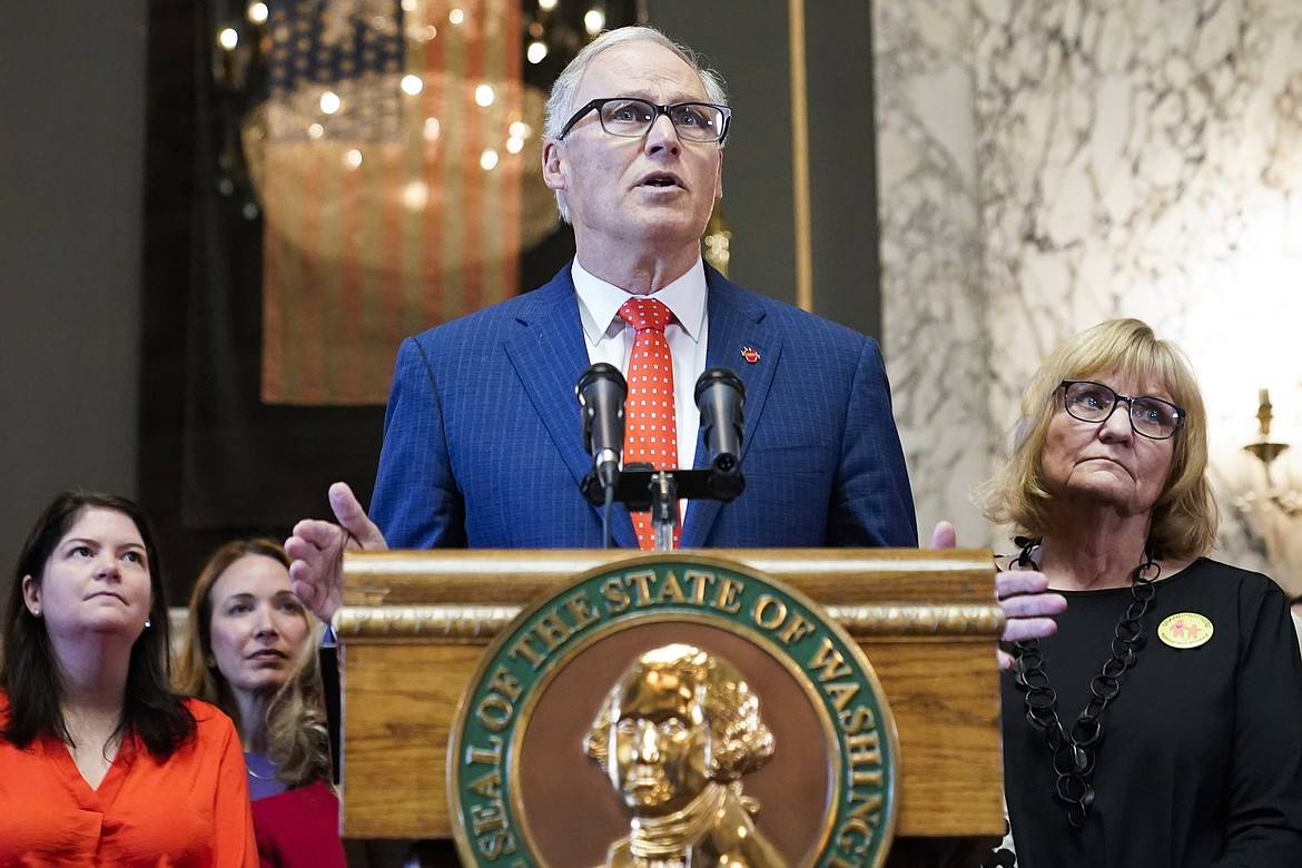 Washington Gov. Jay Inslee speaks before signing multiple bills meant to prevent gun violence, Tuesday, April 25, 2023, at the Capitol in Olympia, Wash. On Monday, May 1, 2023, Inslee announced he does not plan to seek a fourth term. He was most recently re-elected in 2020, making him only the second Washington state governor to serve three consecutive terms.