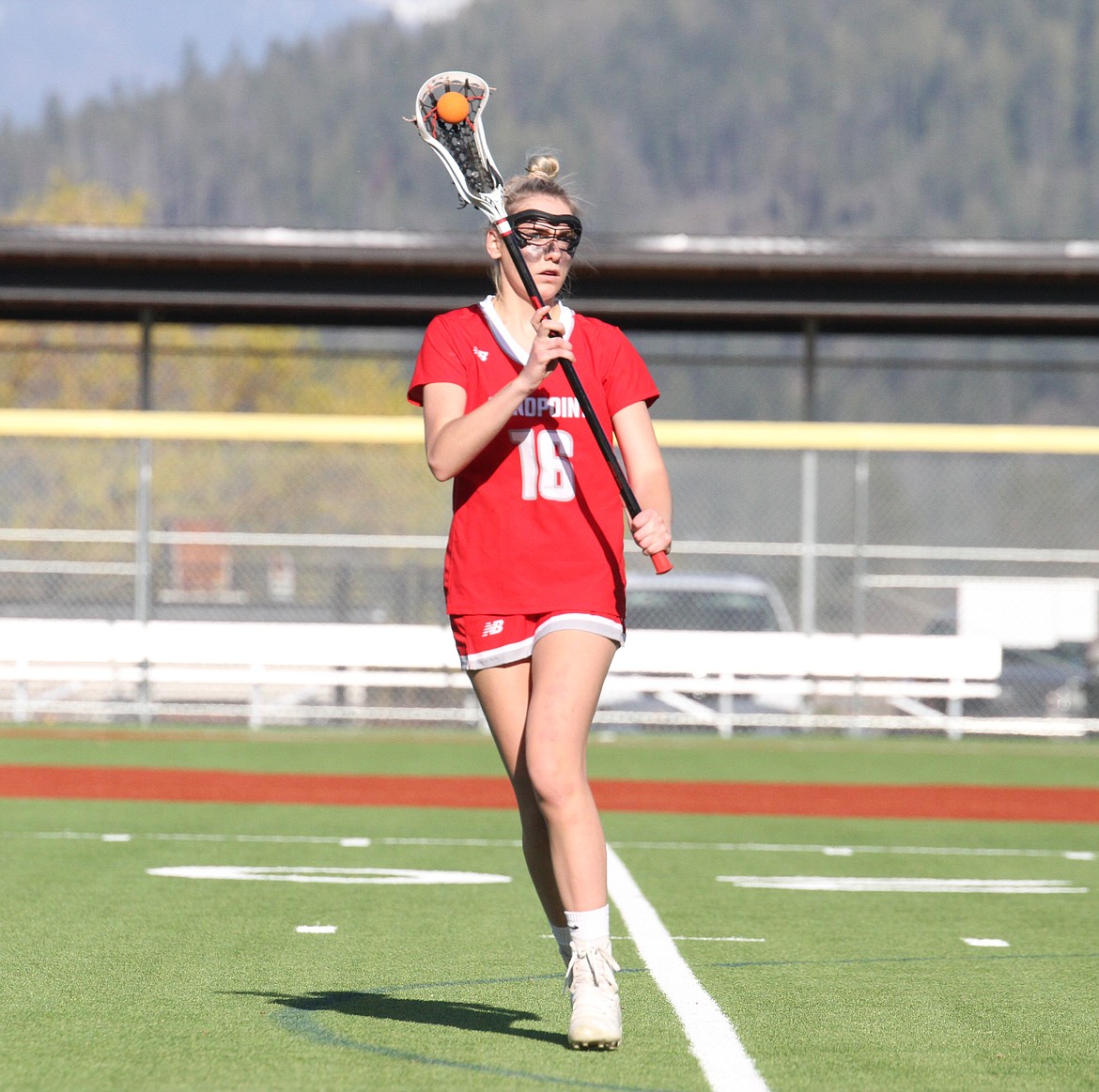 Alexis Downs starts an offensive play that resulted in a goal in the second half of Saturday's 7-6 victory.