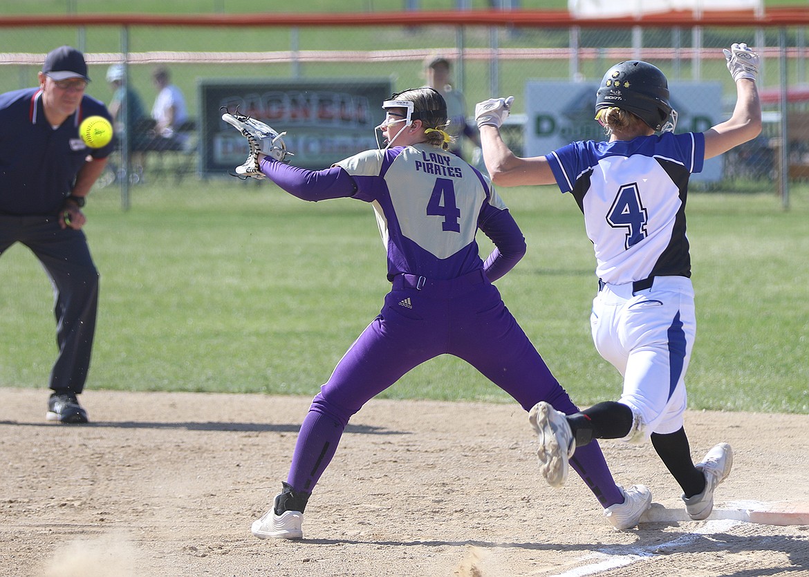 Polson's Kailey Smith leans in for a close play at first during the Frenchtown Invite. (Bob Gunderson photo)