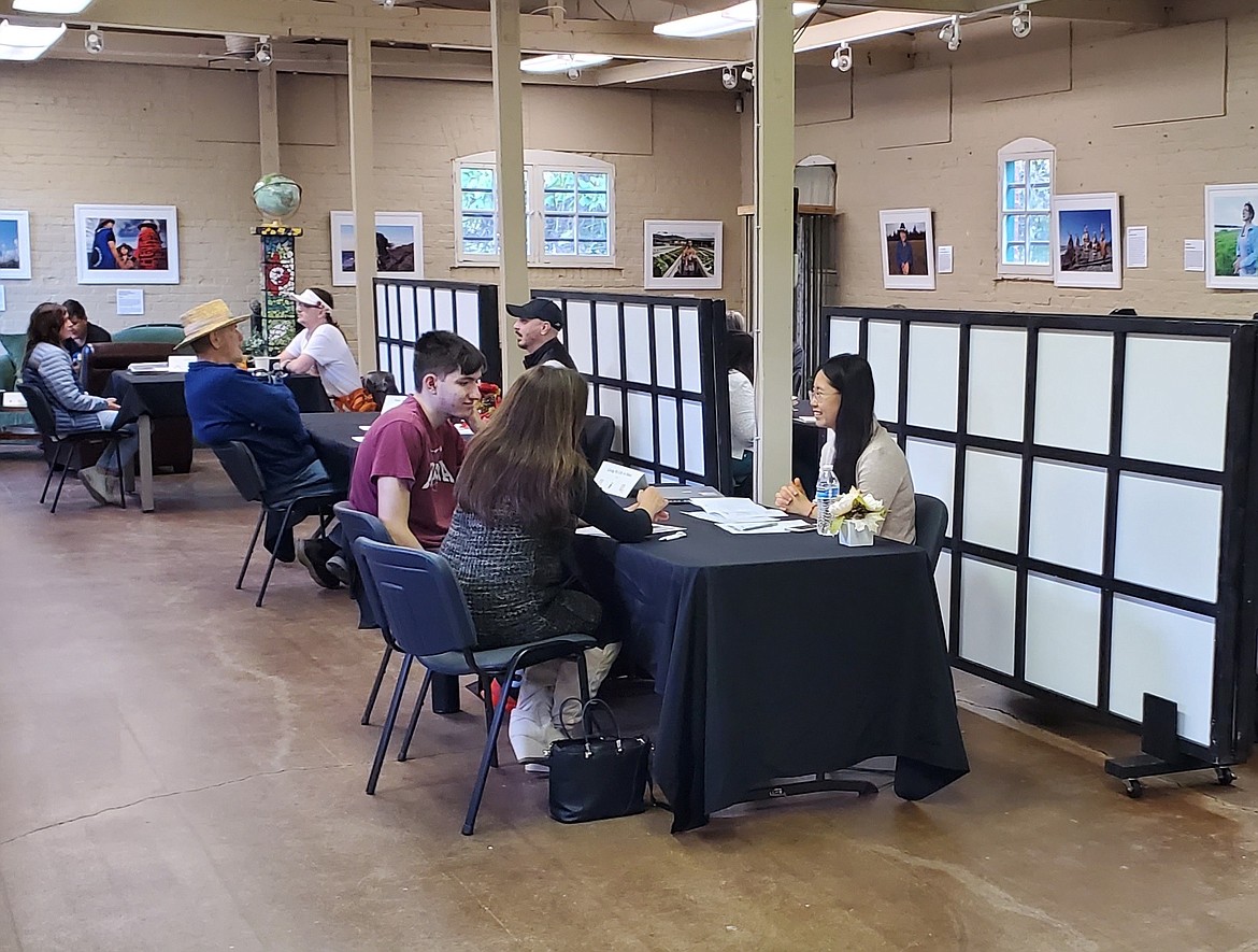 "Books" and "readers" participate in an October 2022 Human Library event at the Human Rights Education Institute. The next Human Library will be May 20 at HREI in Coeur d'Alene.