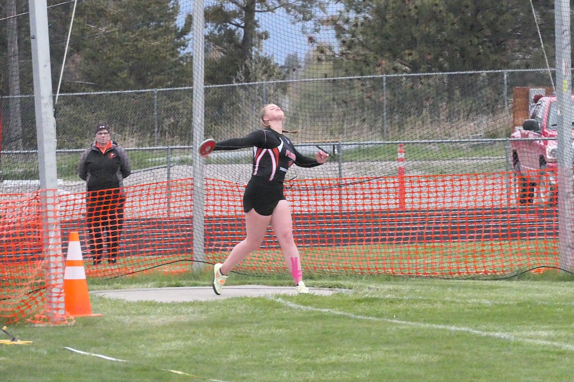 Plains discus thrower Alexis Deming, shown here at last year's 7B District meet, finished third in the discus throw at the Top 10 Invitational meet this past week in Missoula. (Chuck Bandel, VP-MI)