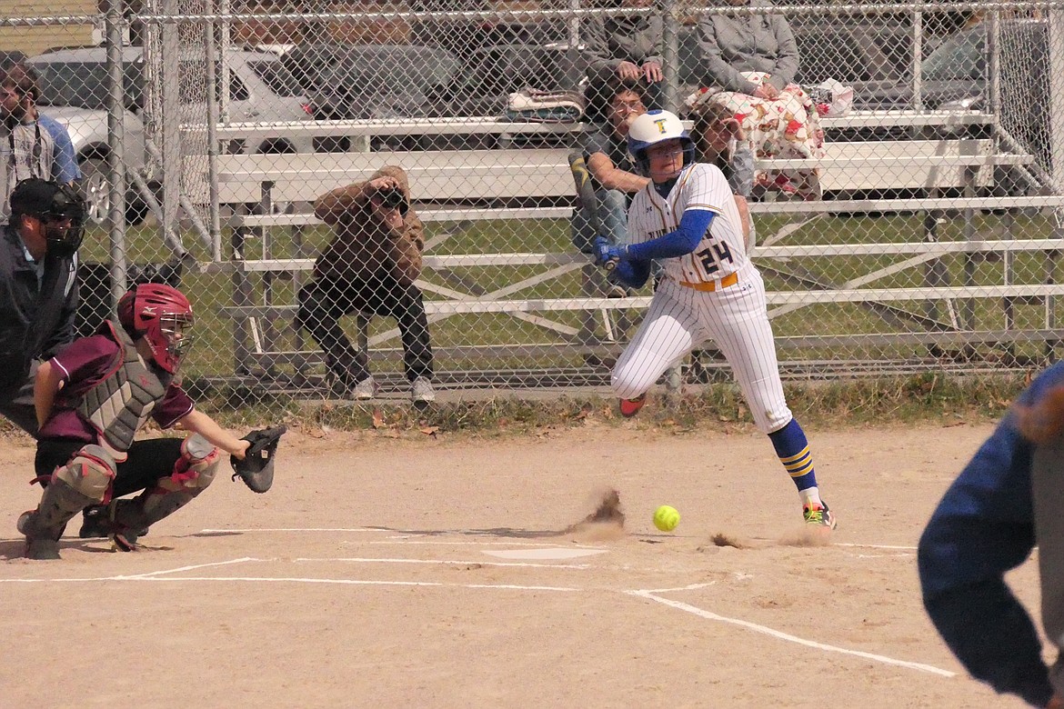 Thompson Falls senior Cheyla Irvine dances out of the way of a low, incoming pitch during the Lady Hawks in over Troy last week at Pirk's Place field in T Falls. (Chuck Bandel/VP-MI)