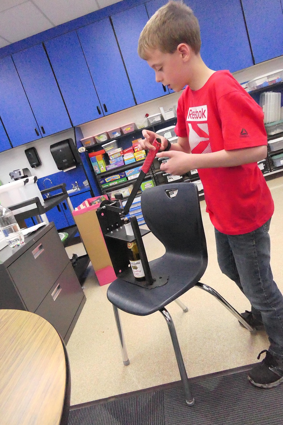 Noxon inventor Tracker Scarlett demonstrates his cork opener device which earned him second place in the 2023 Montana Science Fair competition last month at the University of Montana. (Chuck Bandel/VP-MI)