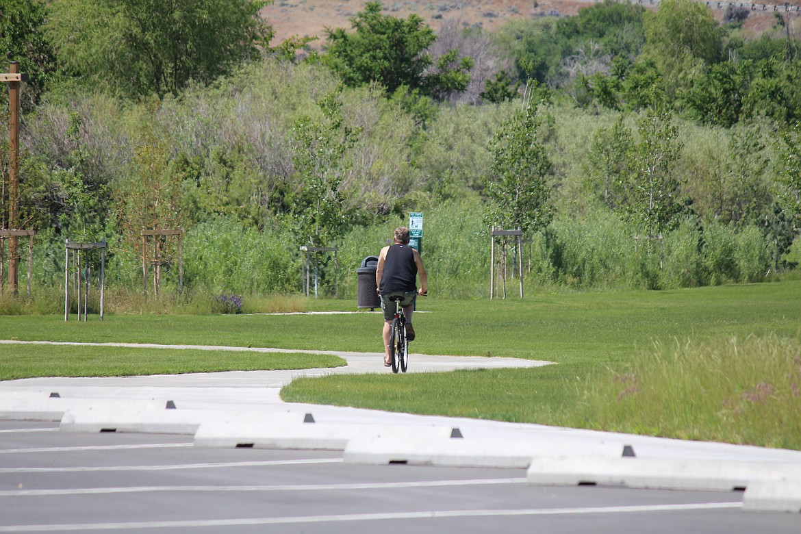 A bike rider on the trail at the Crescent Bar Recreation Area. The Grant County PUD will be conducting in-person surveys at all PUD recreation sites beginning this month.